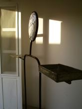 A sculpure by a doorway