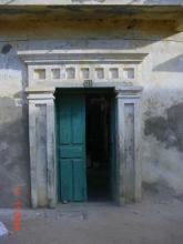 A double doorway with one open door